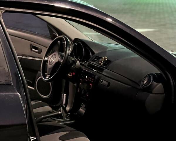 Черный Мазда 3, объемом двигателя 2 л и пробегом 346 тыс. км за 4700 $, фото 10 на Automoto.ua