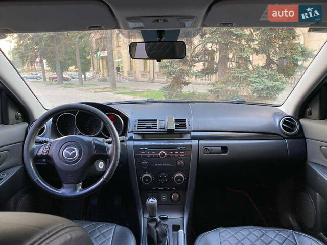 Черный Мазда 3, объемом двигателя 2 л и пробегом 300 тыс. км за 5200 $, фото 7 на Automoto.ua