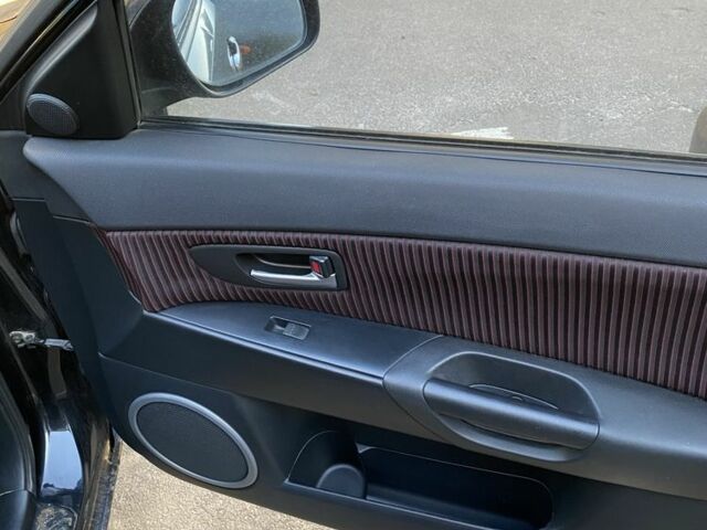 Черный Мазда 3, объемом двигателя 2 л и пробегом 184 тыс. км за 3699 $, фото 15 на Automoto.ua