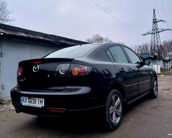 Чорний Мазда 3, об'ємом двигуна 2 л та пробігом 245 тис. км за 5200 $, фото 7 на Automoto.ua