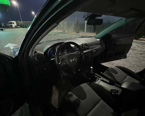Черный Мазда 3, объемом двигателя 2 л и пробегом 346 тыс. км за 4700 $, фото 2 на Automoto.ua