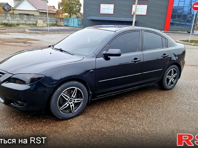 Черный Мазда 3, объемом двигателя 2 л и пробегом 173 тыс. км за 4600 $, фото 6 на Automoto.ua