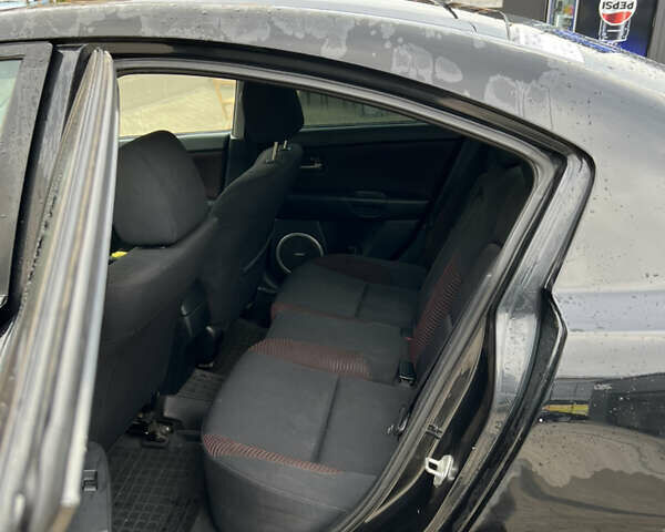 Черный Мазда 3, объемом двигателя 2 л и пробегом 232 тыс. км за 4700 $, фото 8 на Automoto.ua