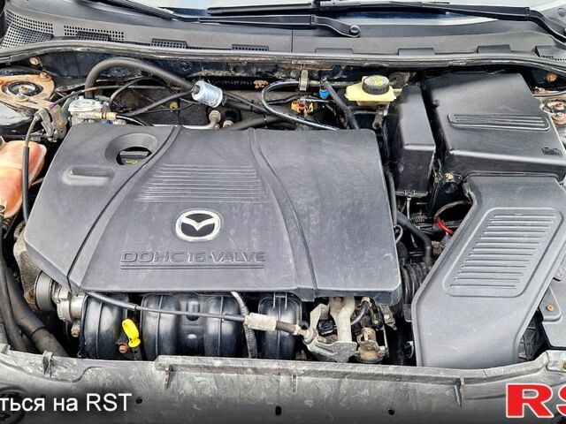 Черный Мазда 3, объемом двигателя 2 л и пробегом 173 тыс. км за 4600 $, фото 10 на Automoto.ua