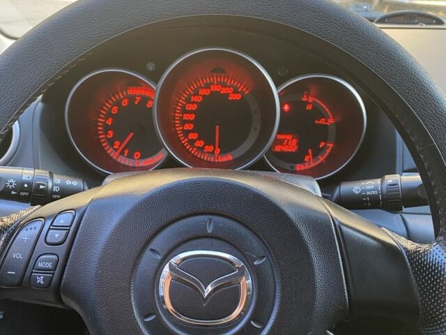 Черный Мазда 3, объемом двигателя 2 л и пробегом 184 тыс. км за 3699 $, фото 13 на Automoto.ua