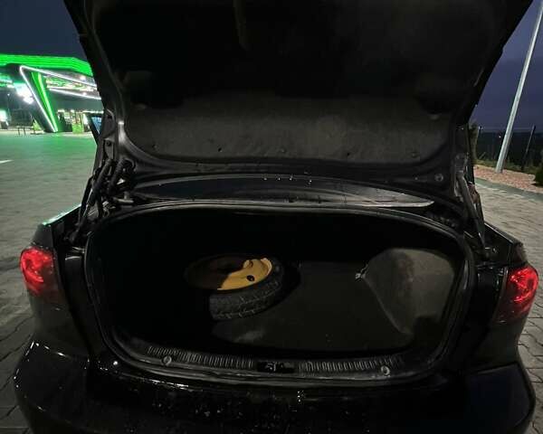 Черный Мазда 3, объемом двигателя 2 л и пробегом 346 тыс. км за 4700 $, фото 4 на Automoto.ua