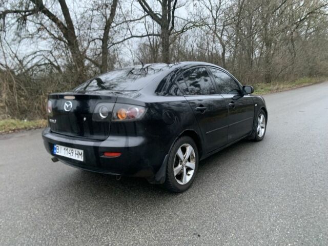 Чорний Мазда 3, об'ємом двигуна 1.6 л та пробігом 214 тис. км за 3750 $, фото 2 на Automoto.ua