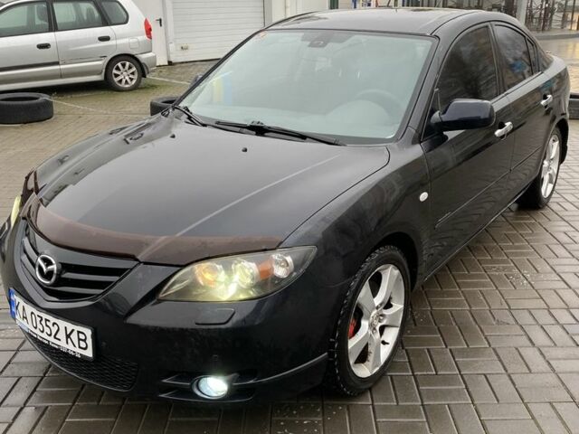 Черный Мазда 3, объемом двигателя 2 л и пробегом 184 тыс. км за 3699 $, фото 1 на Automoto.ua