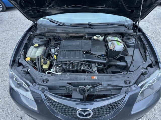 Черный Мазда 3, объемом двигателя 1.6 л и пробегом 250 тыс. км за 3999 $, фото 17 на Automoto.ua