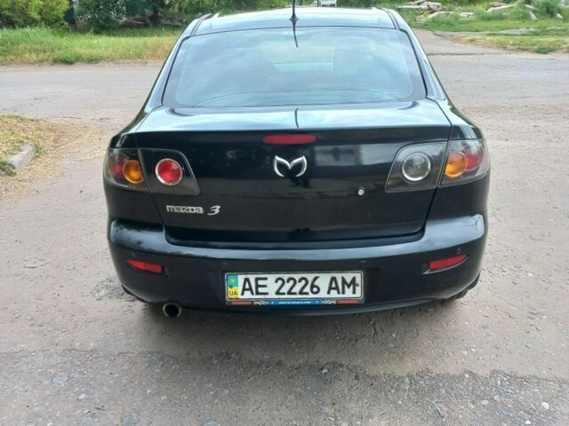 Черный Мазда 3, объемом двигателя 2 л и пробегом 250 тыс. км за 5200 $, фото 6 на Automoto.ua