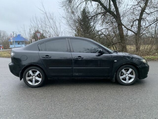 Чорний Мазда 3, об'ємом двигуна 1.6 л та пробігом 214 тис. км за 3750 $, фото 4 на Automoto.ua