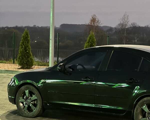 Черный Мазда 3, объемом двигателя 2 л и пробегом 346 тыс. км за 4700 $, фото 3 на Automoto.ua