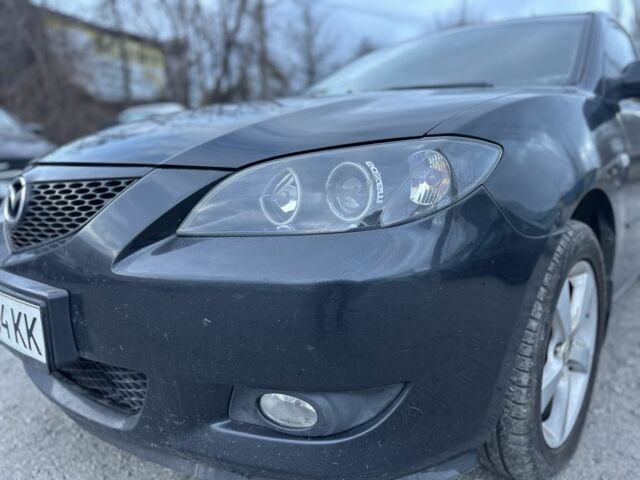 Черный Мазда 3, объемом двигателя 1.6 л и пробегом 250 тыс. км за 3999 $, фото 16 на Automoto.ua