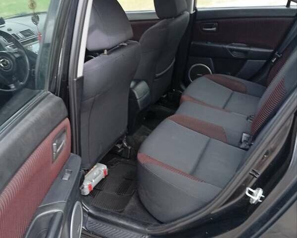 Черный Мазда 3, объемом двигателя 2 л и пробегом 242 тыс. км за 5000 $, фото 26 на Automoto.ua