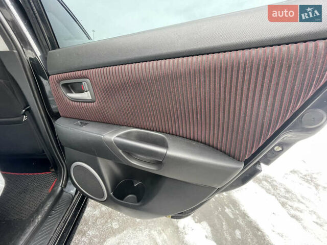 Черный Мазда 3, объемом двигателя 2 л и пробегом 266 тыс. км за 3950 $, фото 12 на Automoto.ua