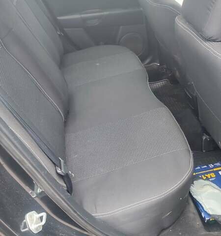 Чорний Мазда 3, об'ємом двигуна 2 л та пробігом 175 тис. км за 5300 $, фото 12 на Automoto.ua