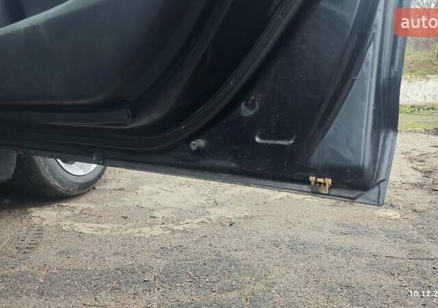 Чорний Мазда 3, об'ємом двигуна 2 л та пробігом 175 тис. км за 5300 $, фото 11 на Automoto.ua