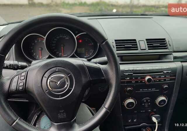 Чорний Мазда 3, об'ємом двигуна 2 л та пробігом 175 тис. км за 5300 $, фото 15 на Automoto.ua