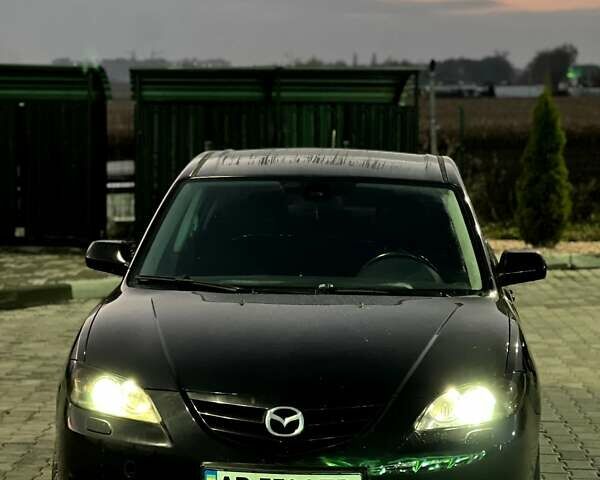 Черный Мазда 3, объемом двигателя 2 л и пробегом 346 тыс. км за 4700 $, фото 11 на Automoto.ua