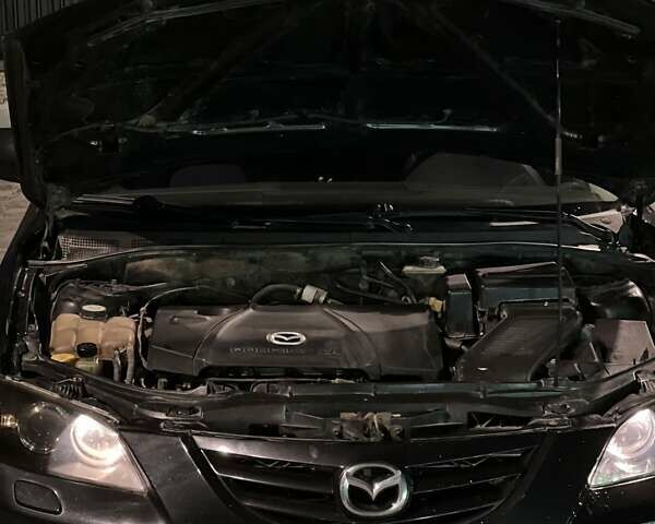Черный Мазда 3, объемом двигателя 2 л и пробегом 346 тыс. км за 4700 $, фото 17 на Automoto.ua