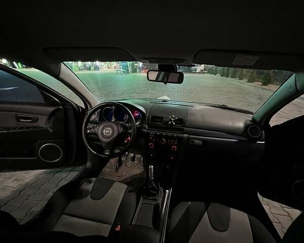 Черный Мазда 3, объемом двигателя 2 л и пробегом 346 тыс. км за 4700 $, фото 16 на Automoto.ua