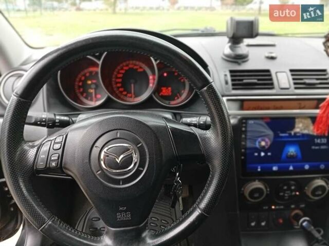 Черный Мазда 3, объемом двигателя 2 л и пробегом 242 тыс. км за 5000 $, фото 1 на Automoto.ua