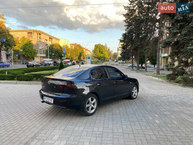 Черный Мазда 3, объемом двигателя 2 л и пробегом 300 тыс. км за 5200 $, фото 3 на Automoto.ua