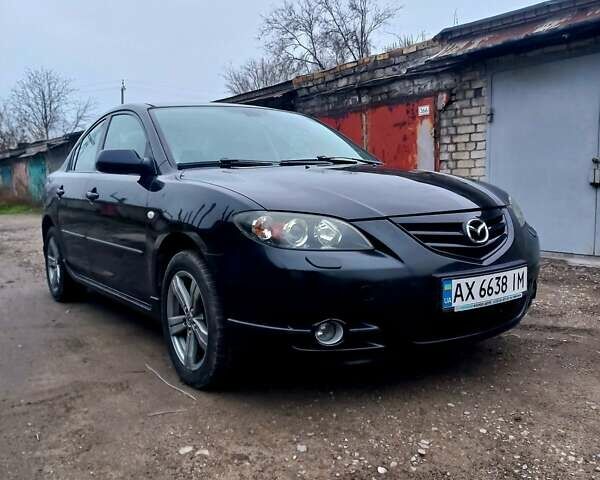 Чорний Мазда 3, об'ємом двигуна 2 л та пробігом 245 тис. км за 5200 $, фото 5 на Automoto.ua