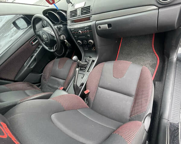 Черный Мазда 3, объемом двигателя 2 л и пробегом 266 тыс. км за 3950 $, фото 14 на Automoto.ua