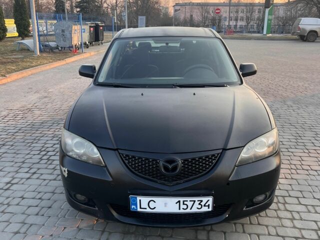 Черный Мазда 3, объемом двигателя 1.6 л и пробегом 200 тыс. км за 1800 $, фото 1 на Automoto.ua