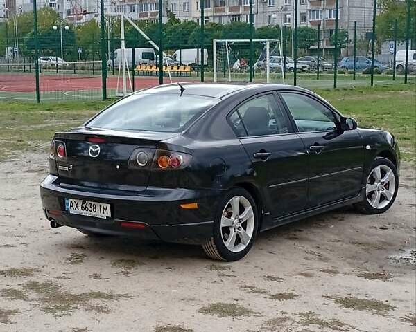 Черный Мазда 3, объемом двигателя 2 л и пробегом 242 тыс. км за 5000 $, фото 20 на Automoto.ua