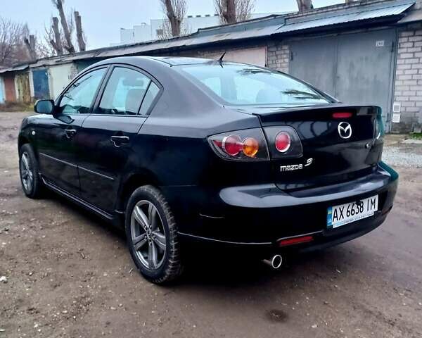 Чорний Мазда 3, об'ємом двигуна 2 л та пробігом 245 тис. км за 5200 $, фото 9 на Automoto.ua