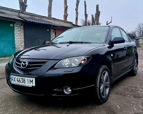 Чорний Мазда 3, об'ємом двигуна 2 л та пробігом 245 тис. км за 5200 $, фото 3 на Automoto.ua