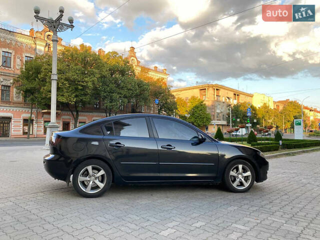 Черный Мазда 3, объемом двигателя 2 л и пробегом 300 тыс. км за 5200 $, фото 2 на Automoto.ua