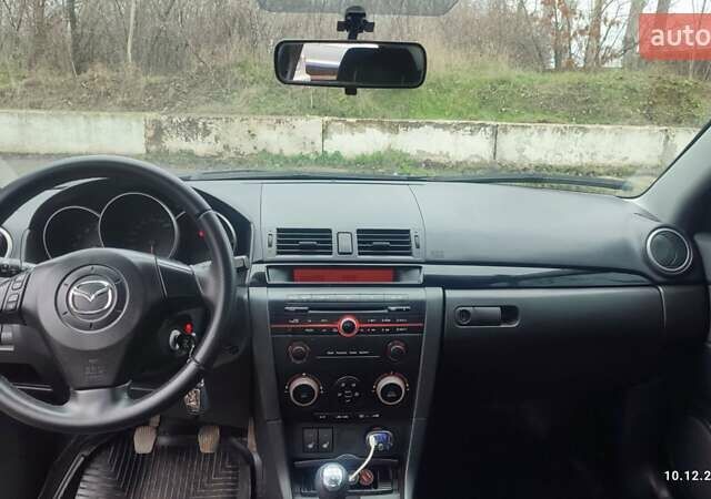 Чорний Мазда 3, об'ємом двигуна 2 л та пробігом 175 тис. км за 5300 $, фото 7 на Automoto.ua
