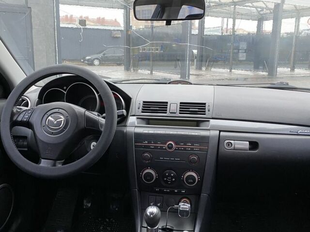 Черный Мазда 3, объемом двигателя 2 л и пробегом 184 тыс. км за 3699 $, фото 5 на Automoto.ua