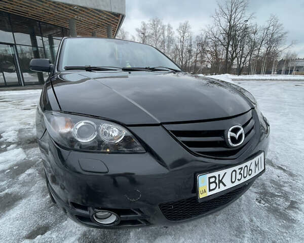 Черный Мазда 3, объемом двигателя 2 л и пробегом 266 тыс. км за 3950 $, фото 9 на Automoto.ua