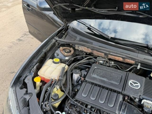 Чорний Мазда 3, об'ємом двигуна 1.6 л та пробігом 240 тис. км за 4850 $, фото 24 на Automoto.ua