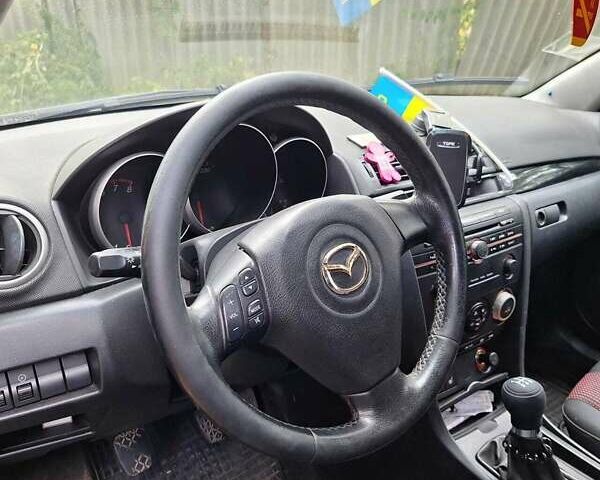 Чорний Мазда 3, об'ємом двигуна 1.6 л та пробігом 267 тис. км за 3900 $, фото 3 на Automoto.ua