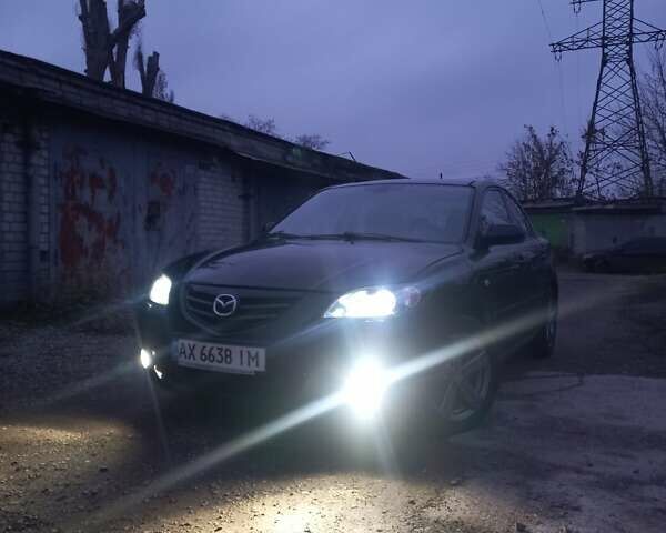 Чорний Мазда 3, об'ємом двигуна 2 л та пробігом 245 тис. км за 5200 $, фото 2 на Automoto.ua
