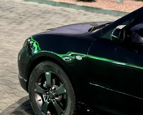 Черный Мазда 3, объемом двигателя 2 л и пробегом 346 тыс. км за 4700 $, фото 1 на Automoto.ua