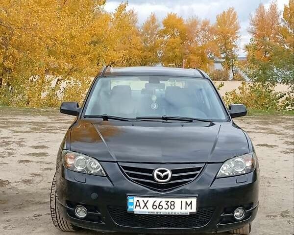 Черный Мазда 3, объемом двигателя 2 л и пробегом 242 тыс. км за 5000 $, фото 15 на Automoto.ua