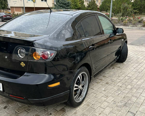 Черный Мазда 3, объемом двигателя 2 л и пробегом 232 тыс. км за 4700 $, фото 2 на Automoto.ua