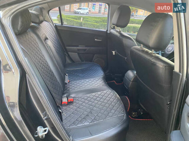 Черный Мазда 3, объемом двигателя 2 л и пробегом 300 тыс. км за 5200 $, фото 6 на Automoto.ua