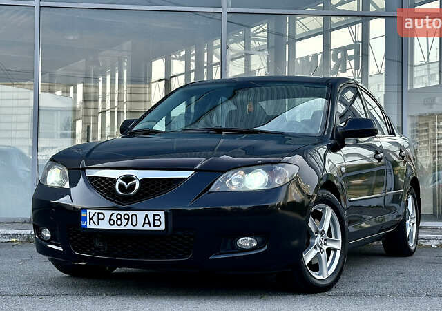 Черный Мазда 3, объемом двигателя 1.6 л и пробегом 224 тыс. км за 5900 $, фото 1 на Automoto.ua