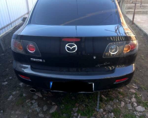 Чорний Мазда 3, об'ємом двигуна 1.6 л та пробігом 195 тис. км за 4300 $, фото 1 на Automoto.ua