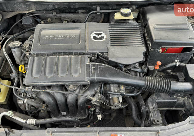 Чорний Мазда 3, об'ємом двигуна 1.6 л та пробігом 237 тис. км за 5850 $, фото 60 на Automoto.ua