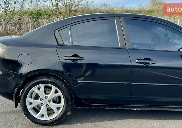 Черный Мазда 3, объемом двигателя 1.6 л и пробегом 247 тыс. км за 5550 $, фото 15 на Automoto.ua