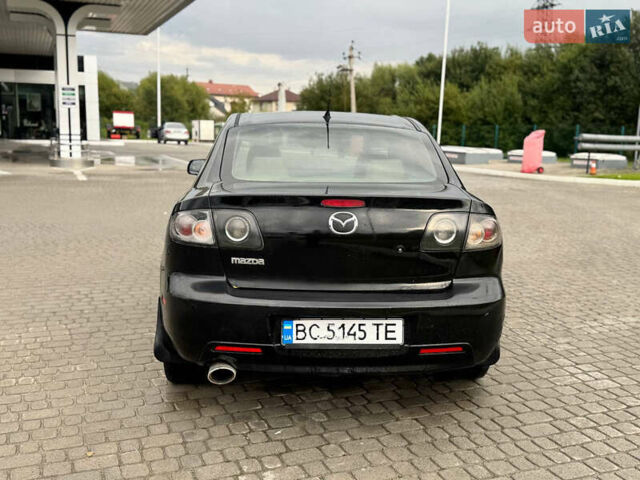 Чорний Мазда 3, об'ємом двигуна 1.6 л та пробігом 231 тис. км за 3650 $, фото 7 на Automoto.ua