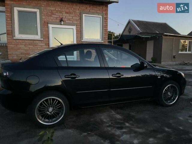 Черный Мазда 3, объемом двигателя 1.6 л и пробегом 173 тыс. км за 6300 $, фото 3 на Automoto.ua